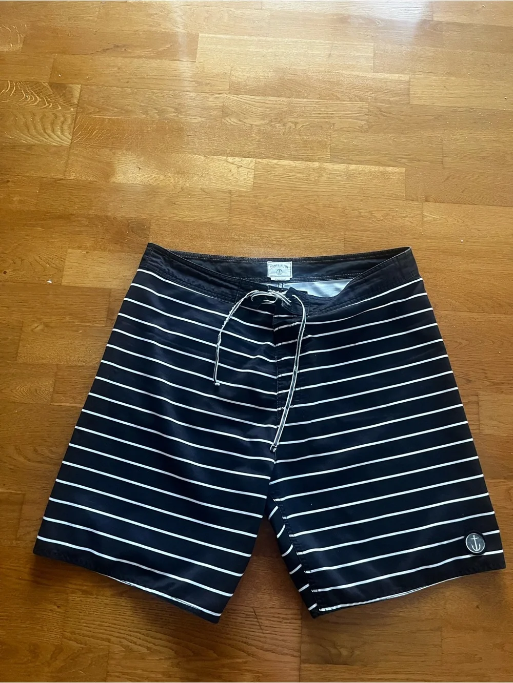 Striped Black & White Men's Swim Board Shorts with Anchor Detail